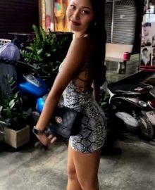 Teen asian bargirl posing for client