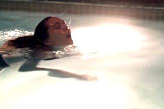 Elizabeth Olsen Climbing Out Of The Pool In A Bikini