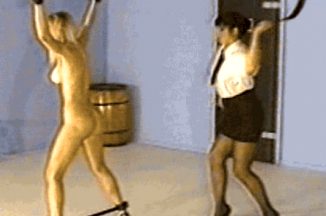 femdom mistress violently whips her slave's ass